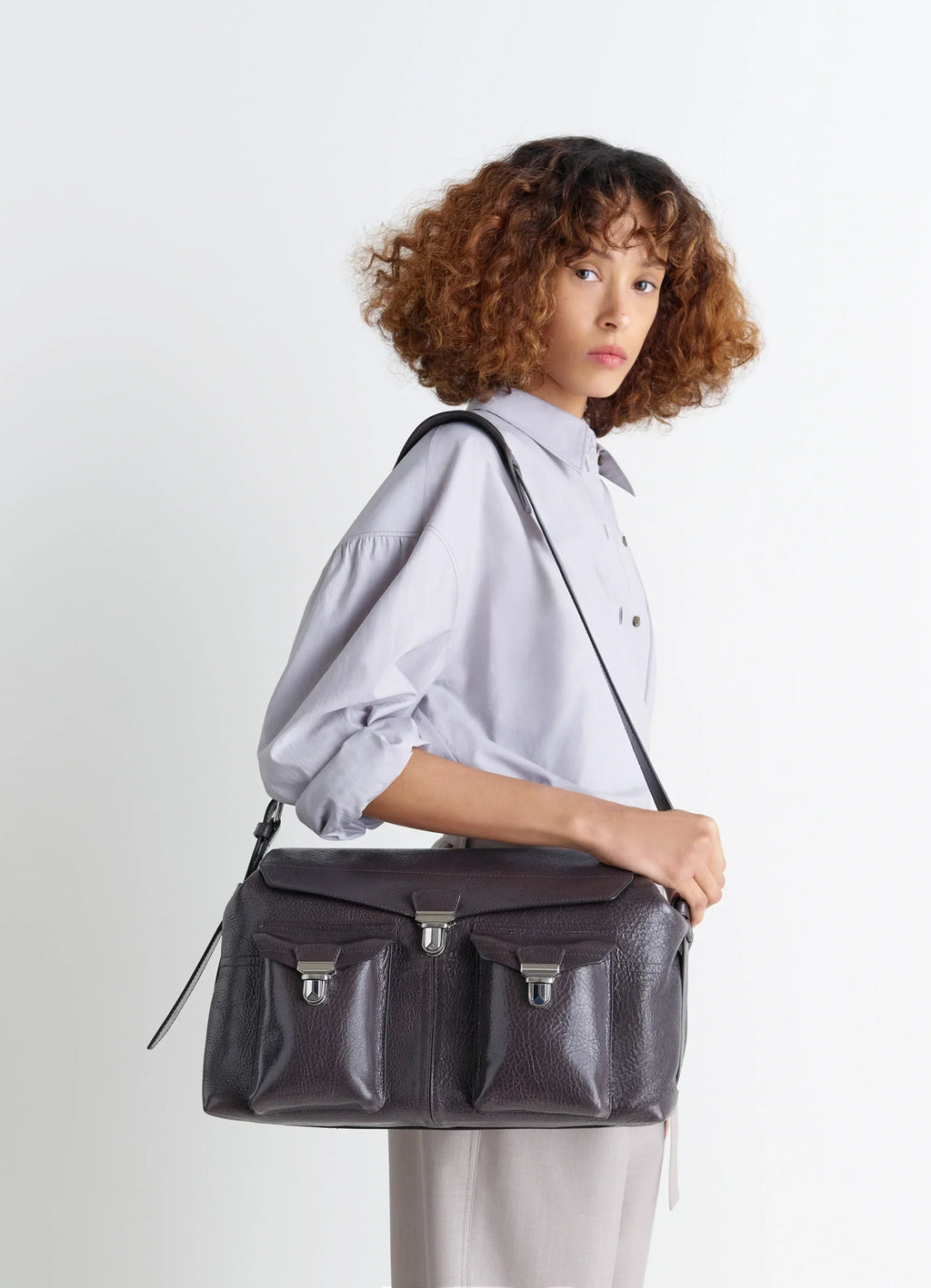 WEEK-END GEAR BAG IN GLOSSY VEGETABLE LEATHER