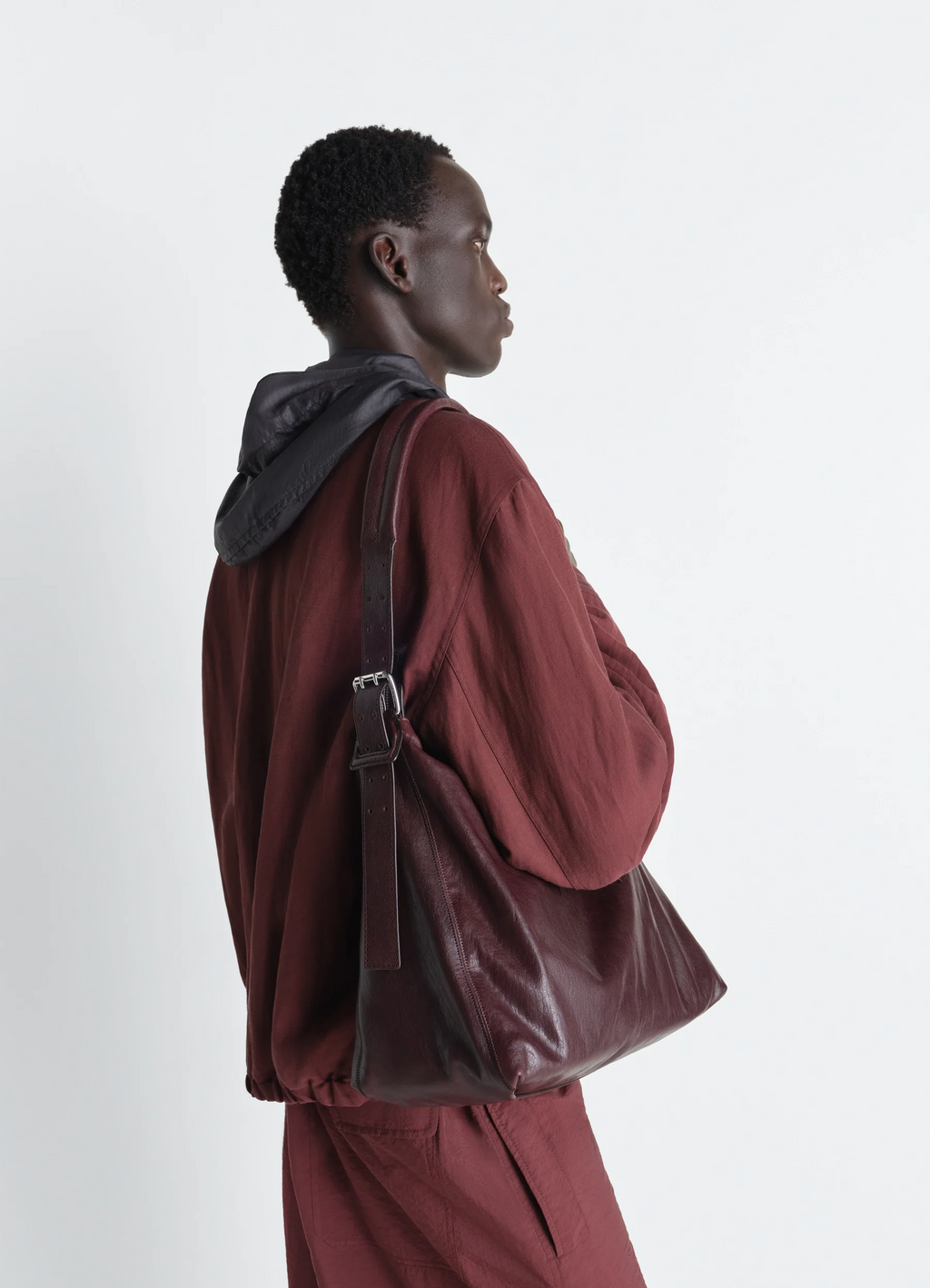 SMALL BELTED HOBO BAG IN PAPER LUX LEATHER