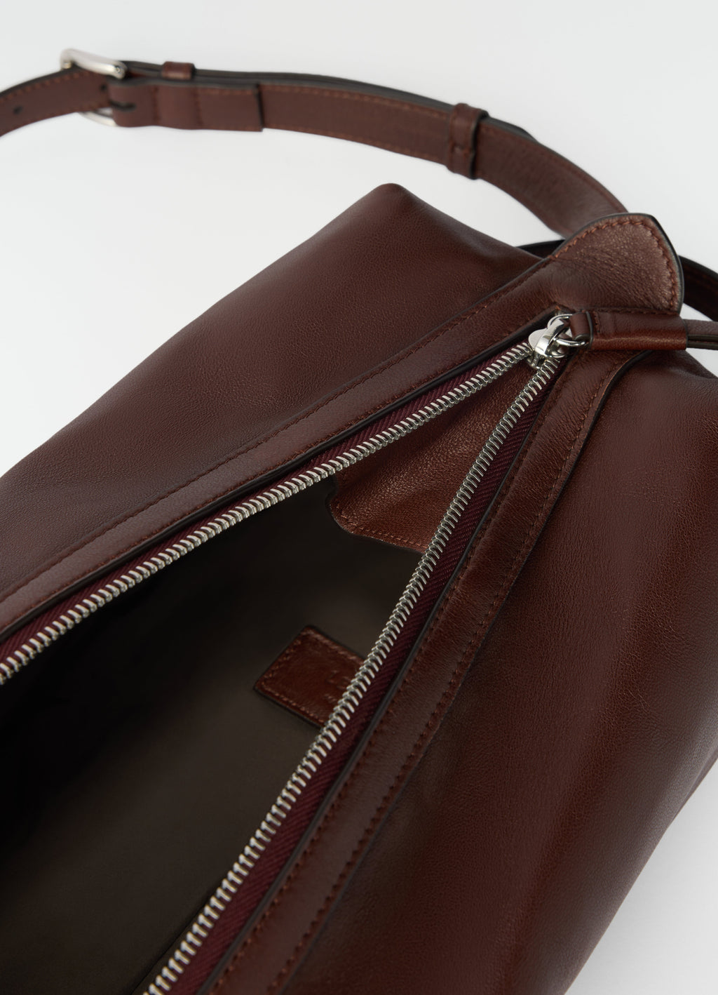 THE CARE SLINGBAG IN SOFT NAPPA LAMBSKIN LEATHER