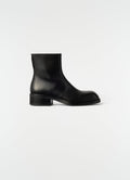 ZIPPED BOOTS IN SHINY VEGETABLE LEATHER