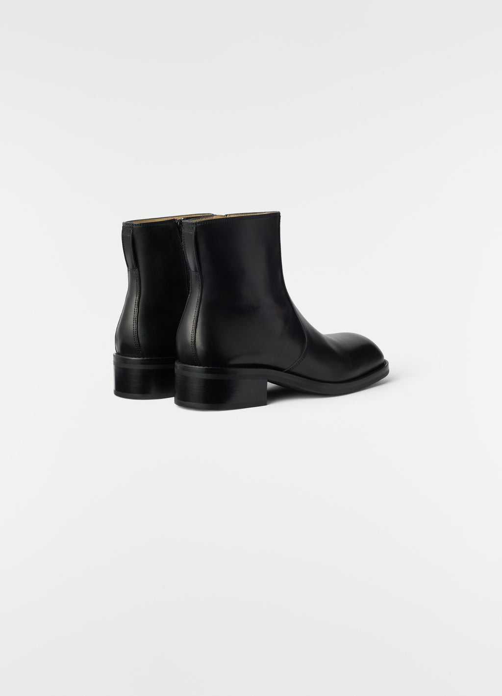 ZIPPED BOOTS IN SHINY VEGETABLE LEATHER
