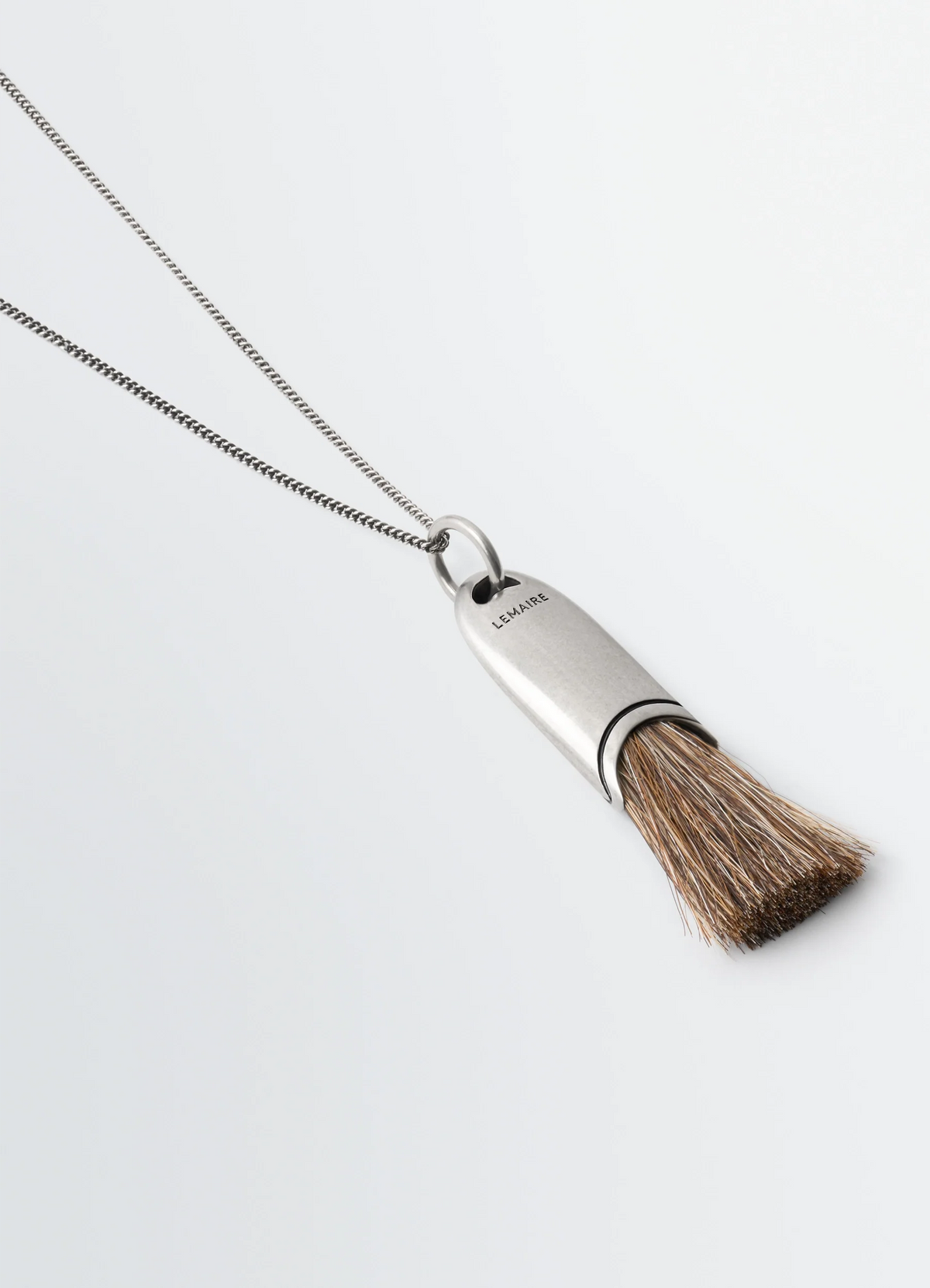 PERSONAL BRUSH NECKLACE IN BRASS