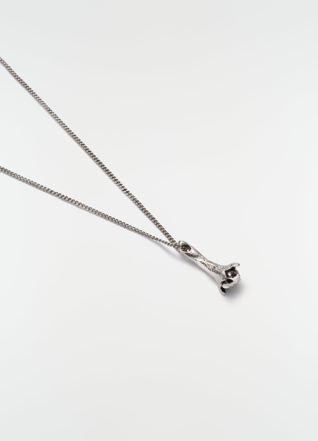 CLOVE NECKLACE IN BRASS