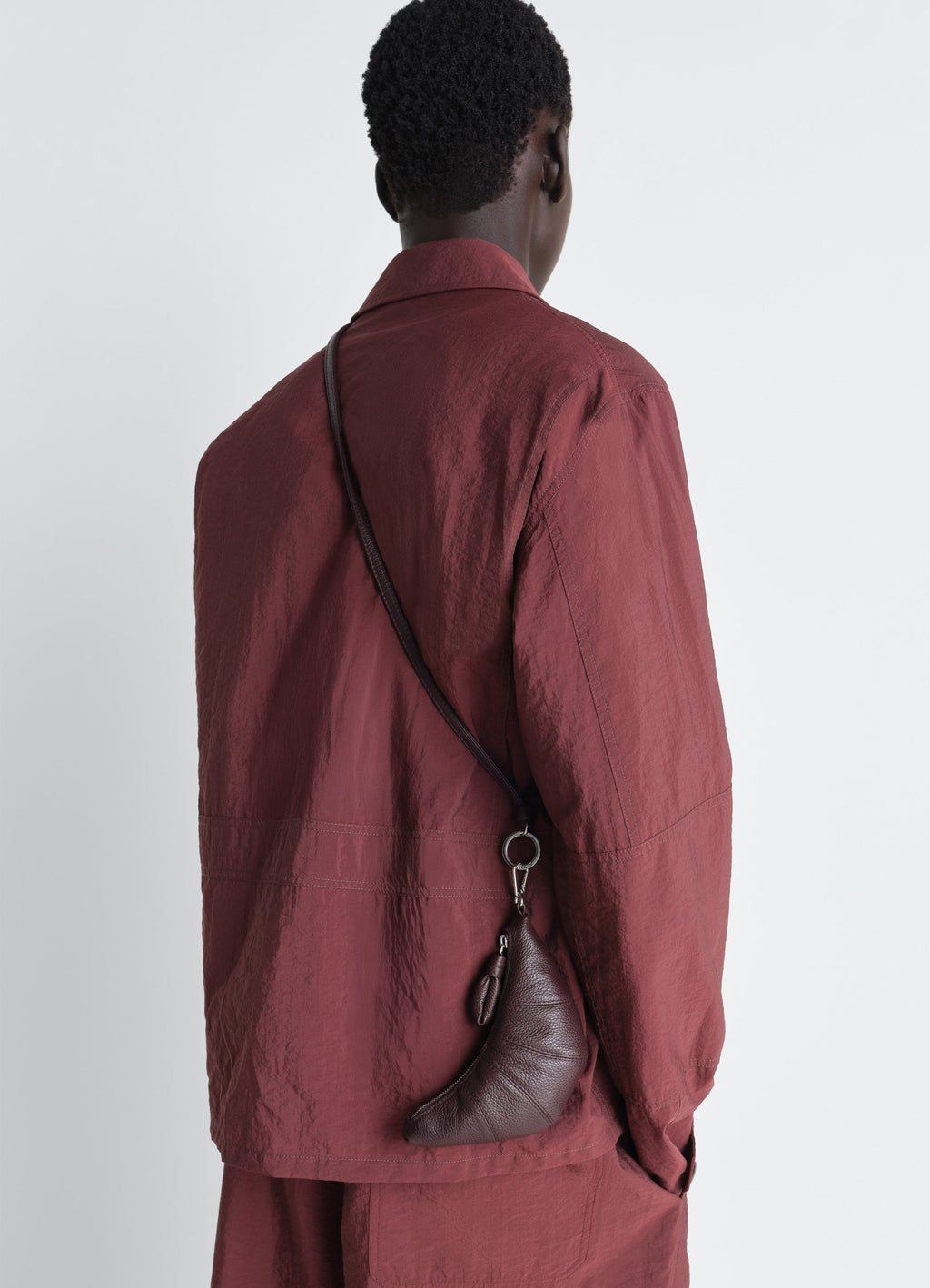 CROSSBODY CROISSANT COIN PURSE IN SOFT GRAINED LEATHER