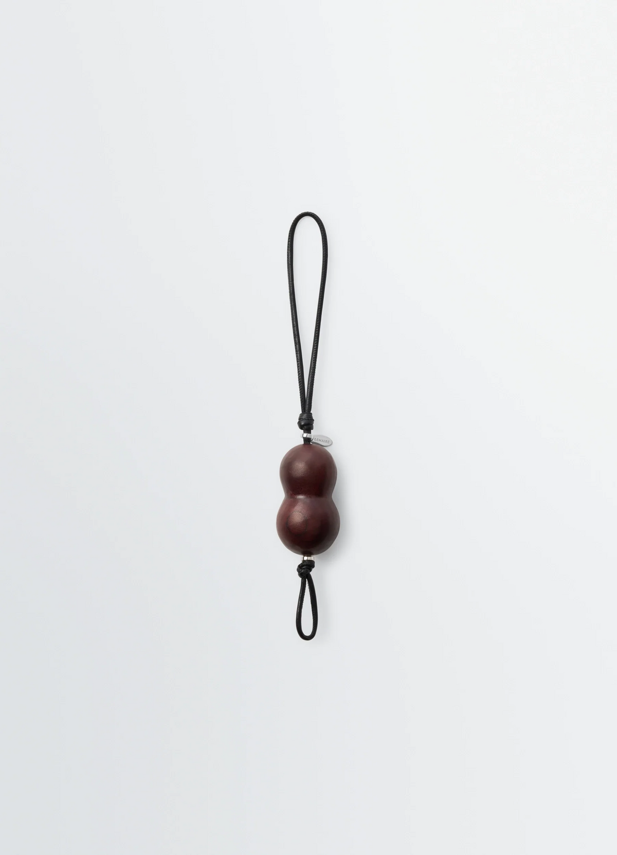 PEANUT HEEL CHARM IN STACKED LEATHER