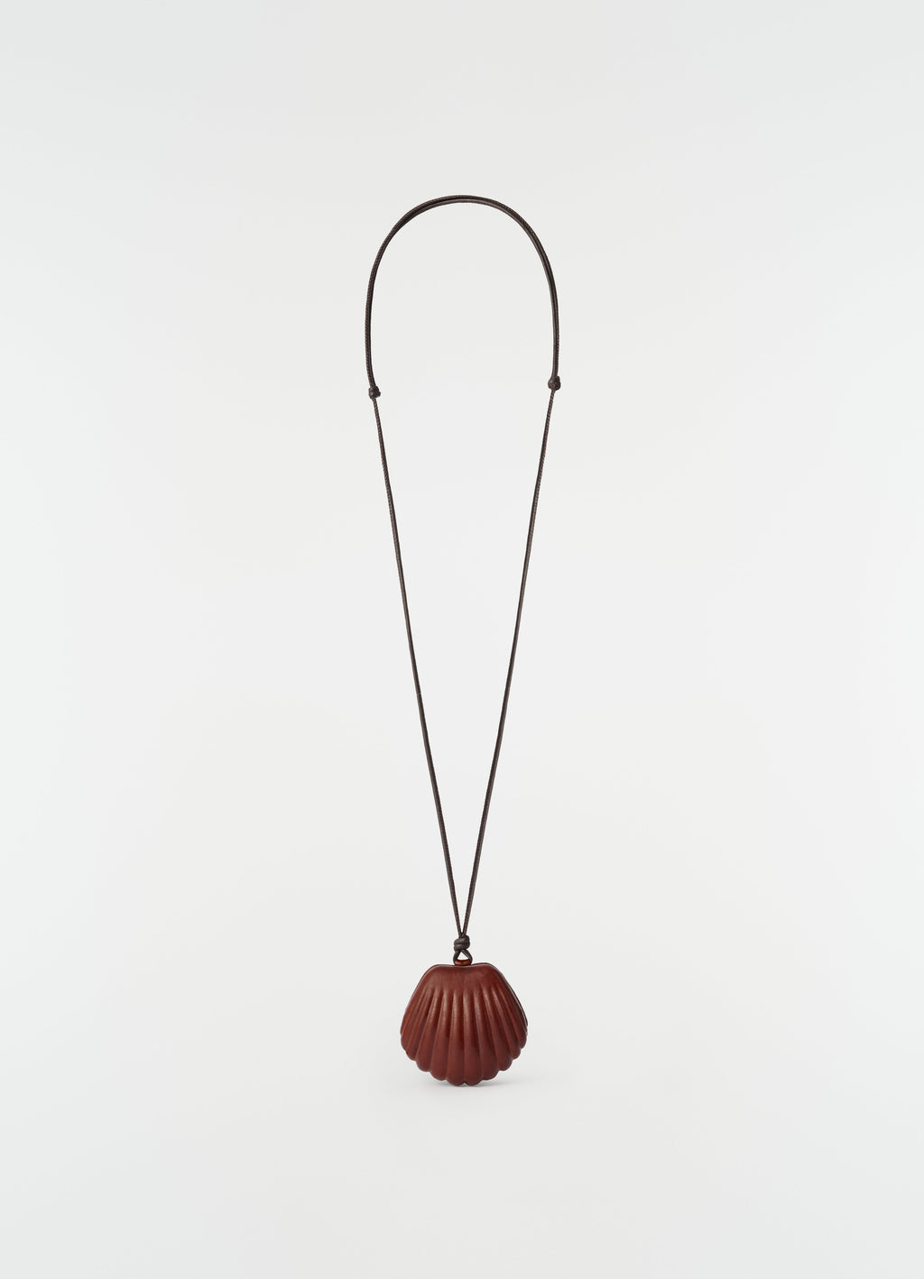 COLLIER MIROIR CARLOS SHELL EN CUIR DE VEAU BÉBÉ