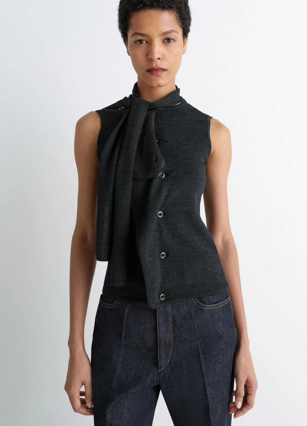 ASYMMETRICAL SLEEVELESS CARDIGAN IN MERINO BLEND